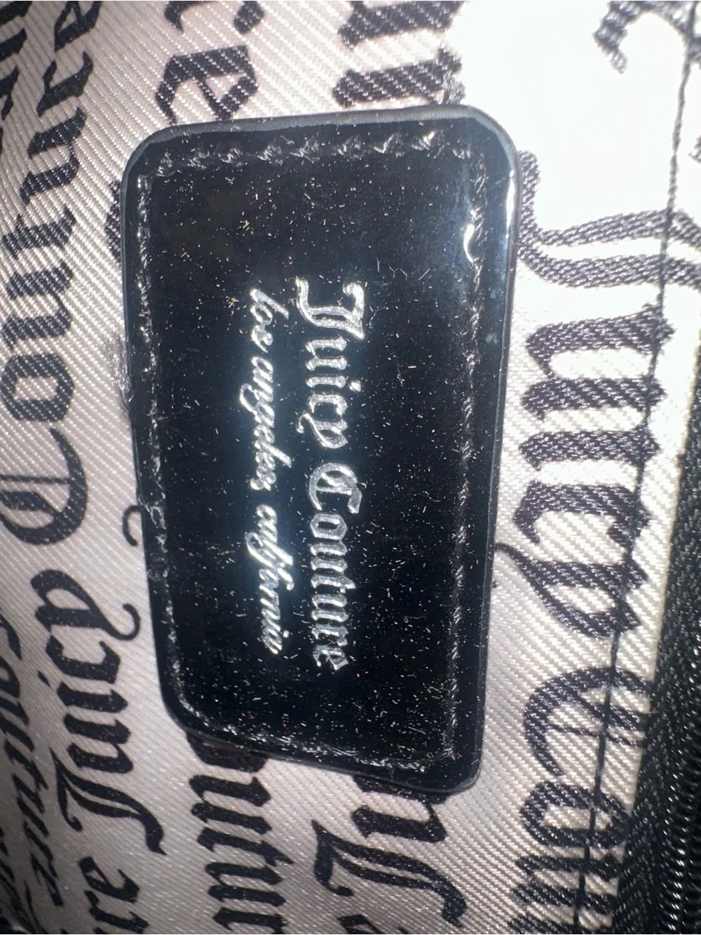 Juicy Couture Black Patent Mini Backpack, new without tags. Excellent condition.
